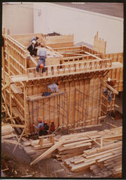 Carpentry students work on wooden frame, ca. 1980