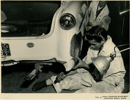 Roughing out the quarterpanel ca. 1954