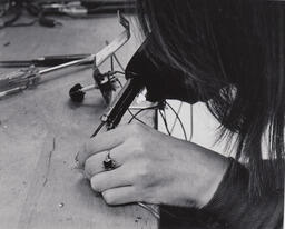 Student using a dremel, ca. 1974