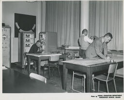 Navigation instructors in a classroom, ca. 1964