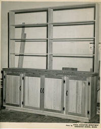Wooden cabinet under construction.