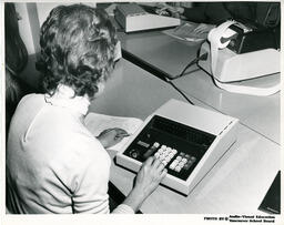 Student using a calculator, ca. 1972