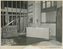 Part of brick wall in classroom, ca. 1955
